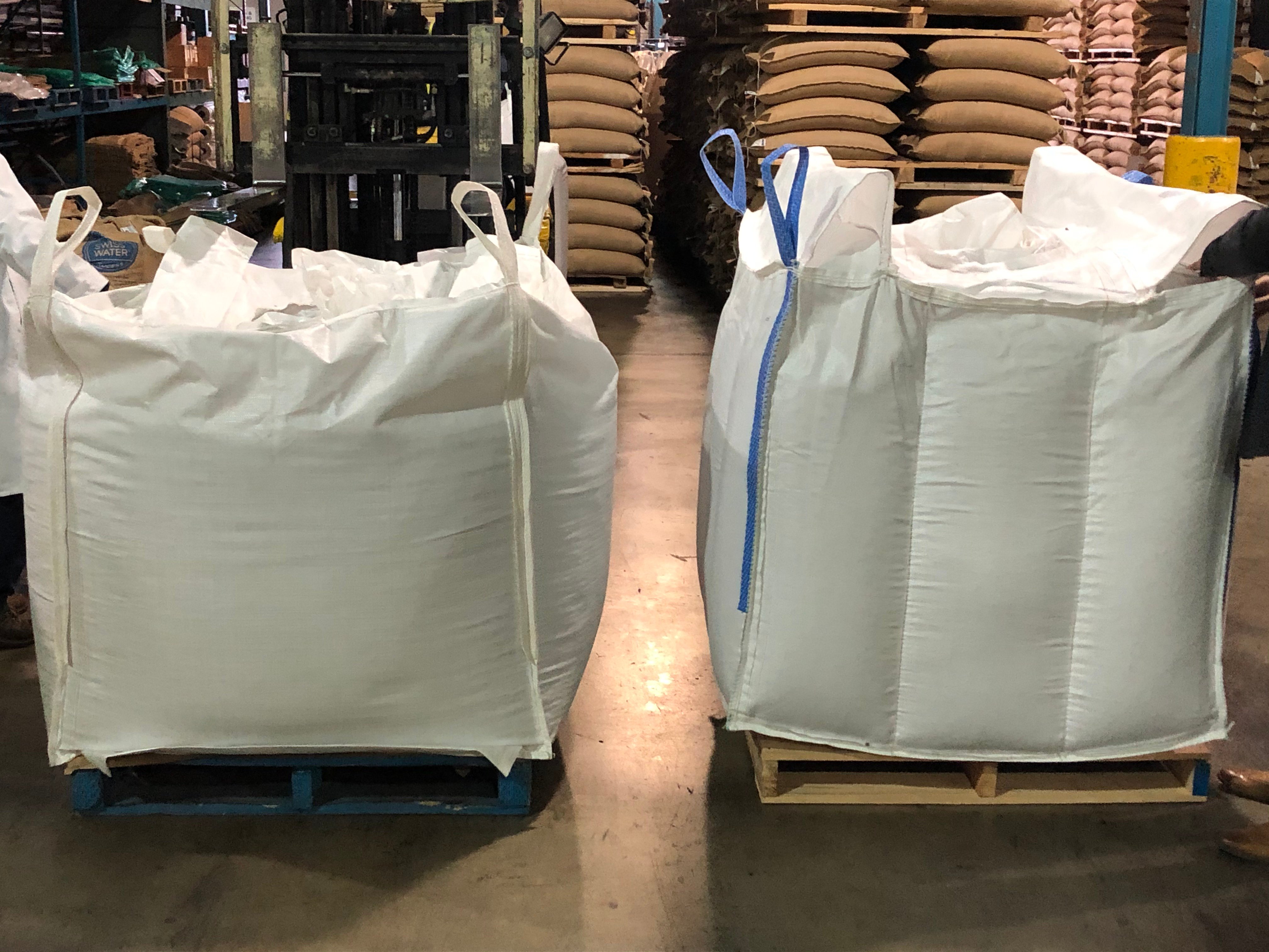 Two baffle-like bags side by side in a warehouse.