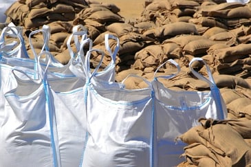 Bulk bags and PP woven bags together for a dam wall.