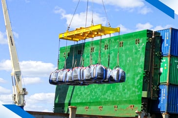 MiniBulk bags being transported by crane. 